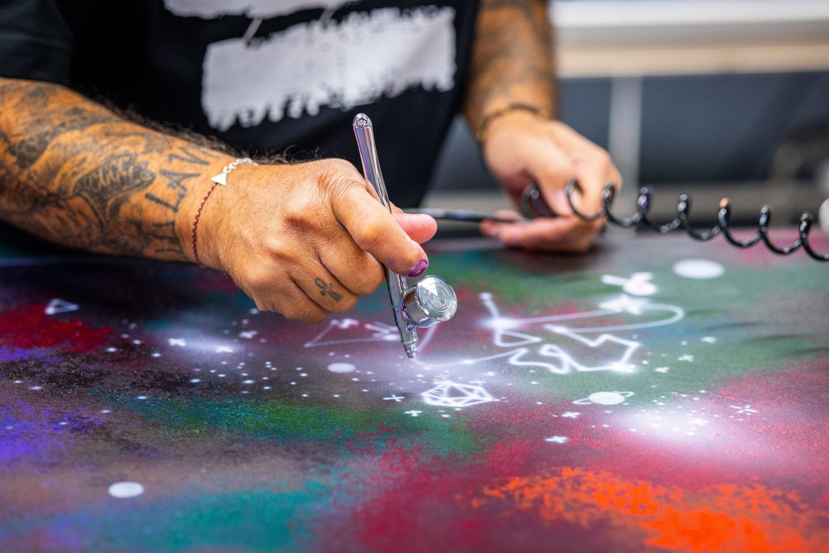 SMALL_Cyril Kongo hand-painting the Starlight Headliner at Rolls-Royce (1)
